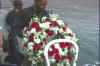 Richie Kohler throws wreath. Photo: Jennifer Lorenz