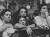 Tensely awaiting the first rescue ships to reach New York, relatives swarm to the pier as the Ile de France and the Cape Ann come into port. They are anxious to hear the reading of the list of survivors. Photo: Life Magazine